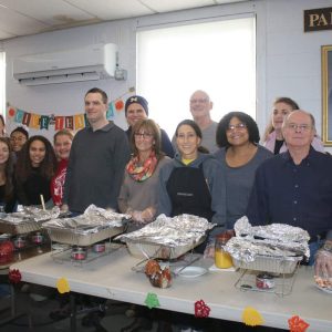 Servers, including volunteers from church and their friends, prepared to serve food. Shown from right to left: Kyle Fowler, Juliana Heikkinen, Aja Swank, Brian Christie, Terri Christie, Diane Aucelle, Sandra Rodrigues and Mile Erisman; back row: Renee Swank, Alex Rodrigues, Amanda Maffeo, Mayor Gary Christenson, Pastor Gerry Whetstone, Paula DeLuca and Janice DeLuca.