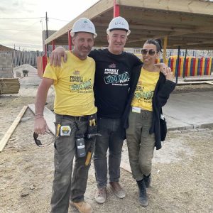 Teresa and Sean Copson with Mellon Educate Founder/Director & CEO Niall Mellon on the job site in Africa.