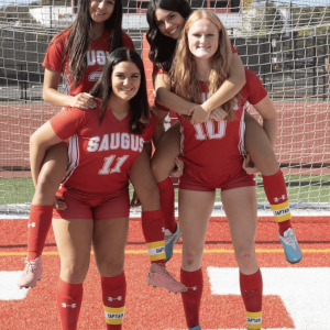 Saugus High School 2024 girls soccer seniors: No. 11 is Tori Carter, and on her back is Madison Botta; No. 10 is Layla Manderson, and on her back is Taylor Deleidi.