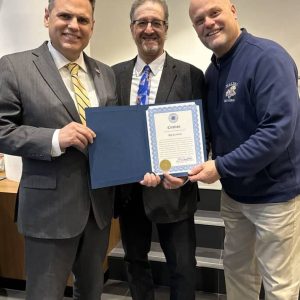 Pictured from left to right: Mayor Gary Christenson, teacher Joe Luongo and Malden High School Principal Chris Mastrangelo. (Courtesy photo)
