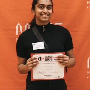 Aarti Ravikumar with her 2026 Broadcom Coding with Commitment® Award (Photo Courtesy of Pioneer Charter School of Science II)