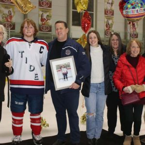 Revere High School hockey player/Co-Captain Ollie Svendsen pictured with his extended family, shown from left to right: Mimi Agnes Svendsen, Ollie Svendsen, father Carl Svendsen, cousin Elizabeth Lake, aunt Erika Svendsen, aunt Susan Conley and uncle Rob Ginsburg.