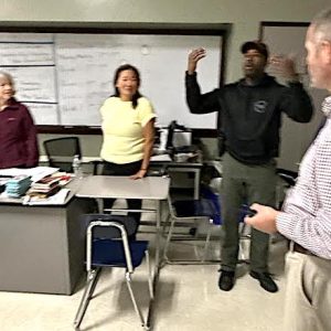 TALKING TO STUDENTS: Malden Police Sgt. Elijah McNeal and Malden High Jenkins House Principal Jayson Payeur talked with students in the last classroom checked for safety, which got high marks for their barricade.