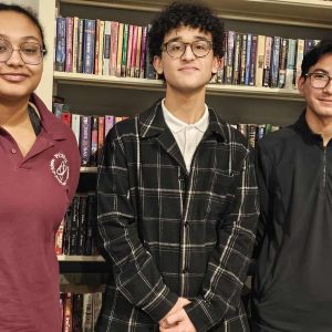 TEEN TUTORS: Left to right: Maria-Eduarda Silva, 17, a junior; Lukeman Nouri, 17, a senior; and Aidan Tum, a junior, 16, are three of the seven students from the Pioneer Charter School of Science II, in Saugus, who have been tutoring students for free at the Saugus Public Library this year. Other student tutors not pictured are Ethan Sydavong, a junior; Tammy Nguyen, a senior; Liza Ivanova, a senior; and Ayomide Osineye, a junior. All of the students get community service credits for their volunteer hours as students. (Saugus Advocate photo by Mark E. Vogler)