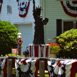 THAT FOURTH OF JULY FEELING: Some folks really know how to decorate for the July 4 holiday – like this home on Lynn Fells Parkway that features the Statue of Liberty in a yard decked out with bunting. (Courtesy Photo of Laura Eisener)