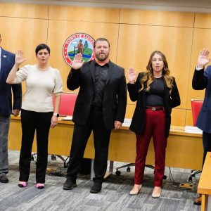 THE NEW SCHOOL COMMITTEE: Left to right: Joseph “Dennis” Gould, Vice Chair Stephanie Mastrocola, Chair Thomas Whittredge and Committee members Shannon McCarthy and Brian Doherty were sworn in last month (Nov. 6) by Town Clerk Ellen Schena. (Saugus Advocate photo by Mark E. Vogler)