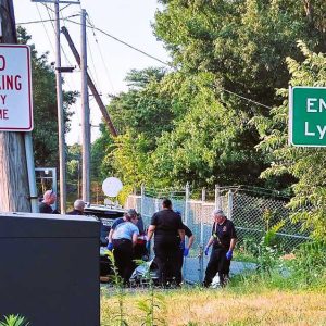 THE RECOVERY: Members of the state Medical Examiner’s Office and emergency responders transport a body discovered on Tuesday in Walden Pond near the Lynnfield/Saugus town line. (Courtesy Photo of Mike Layhe)