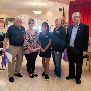 THE SENIOR CENTER HOSTED A HEALTH FAIR: On Friday, Sept. 19, the Saugus-Everett Elks Drug Awareness Committee and the Saugus Senior Center cosponsored a health, wellness and resource fair at the Saugus Senior Center. Over 30 vendors representing the health industry participated and provided free giveaways, raffles and educational material health screenings, including free Covid-19 and flu shots. This is the second annual health fair by these two organizations, and for the 300-plus residents proved to be a very successful event. Pictured from left to right: Elks Bill Pothier, Senior Center Director Laurie Davis, Elks Janine Mulligan, Linda Fuller and Ron Visconti. (Courtesy photo to The Saugus Advocate).
