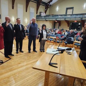 THE SWEARING-IN: Town Clerk Ellen Schena (right) swore in the new Board of Selectmen during a ceremony in the second floor auditorium at Saugus Town Hall on Wednesday (Nov. 8). Pictured from left to right are Board of Selectmen Chair Debra Panetta, Board of Selectmen Vice Chair Jeffrey V. Cicolini and Selectmen Michael Serino, Anthony Cogliano and Corinne R. Riley. (Saugus Advocate photo by Mark E. Vogler)