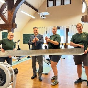 Pictured (from left) Mary Ellen O’Meara, Chamber of Commerce, Mayor Gary Christenson, Owner Bryn Garrity, and Shawn Bonneau.