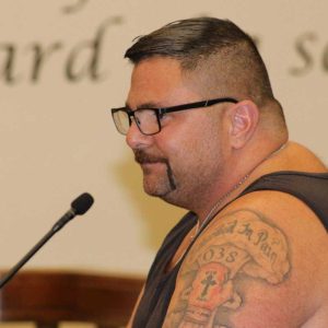 BUSTED: Anthony “The Razor” Raymond is shown at a past city council meeting during public participation at the City Council Chambers. Raymond was arrested on Wednesday on felony charges on two counts of intimidation of a witness.   (Advocate file photo)