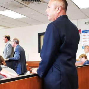 UNCERTAIN FUTURE: Then-Saugus Selectman Mark Mitchell stared ahead during his arraignment in Suffolk Superior Court, shortly after his indictment in July of 2019 for embezzling $1.3 million from the Boston Center for Adult Education (Saugus Advocate file photo by Mark E. Vogler)
