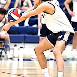 Joan Dias Vargas returns a North Quincy volley for Malden. (Courtesy/Maldonian/MHS Yearbook)