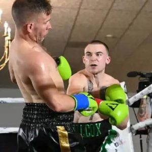 Everett welterweight boxer Shea “Showtime” Willcox (3-0 all by knockouts) will be returning to the North Shore to fight at Revere’s Oceanside Events Center on Saturday, Aug. 16. Willcox, shown above, stuns his opponent with a punch during a recent fight. (File photo / Emily Harney)