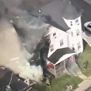 AERIAL VIEW: Firefighters battled a four-alarm blaze at a Malden multi-family residence at 206 Ferry St. on Wednesday afternoon. (Courtesy/Channel 7 News)