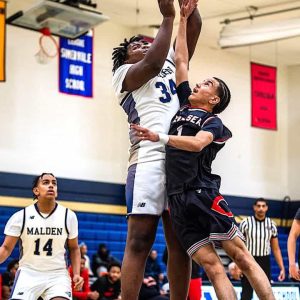 Junior Earl Fevrier rises up with a shot for Malden against Chelsea.
