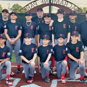 The 2025 Everett Little League Williamsport all-stars are, from left, second row, Jovani Namey, coach Billy Kotsiopoulos, Symon Golden, Denzel Reyes, coach Jimmy Schaefer, Niko Kotsiopoulos, Jason Oliveira, Jr., Joshua O’Neil Santana and manager Kevin Blatt. First row, Kayaki “KJ” Battle, Lorenzo Papa, Albert Yan, Giovanni Blatt and Angel Baca. Missing from photo, Logan Salie. (Courtesy photo)