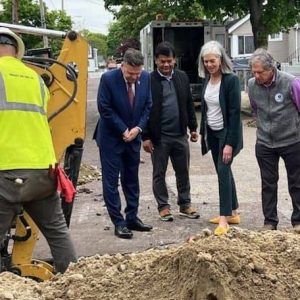 Malden has gone from having the most lead pipes in the Commonwealth of Massachusetts to being a regional leader in lead pipe replacement in just seven years. Above, pictured from left to right: Mayor Gary Christenson, City Engineer Yem Lip, Democratic Whip Katherine Clark, EPA Regional Administrator David W. Cash and Mass. Energy & Environmental Affairs Secretary Rebecca Tepper inspect a lead pipe replacement project in Malden. (Courtesy/City of Malden)