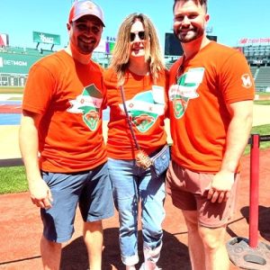 The second annual #spreadingORANGE MS4MS charity event will be held at Fenway Park on Saturday, Sept. 21 in conjunction with the Red Sox game that day against the Minnesota Twins. Former Saugus American Little League 2003 World Series hero Dario Pizzano, the charity’s director, right, is with his mom, Tracie, and Sam Greenberg, the MS4MS CEO, at last year’s Fenway event. MS4MS (Mission Stadiums for Multiple Sclerosis) is a charity that Dario got behind when he was a player in the Seattle Mariners organization, because of his mom, who has been living with MS since 1998. (Courtesy photo)