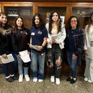 Student Translators helped out at Back to School Night under the supervision of English Learner Program Manager Jen McCabe. Above they are shown being greeted by Malden School Committee Vice Chair Jennifer Spadafora.