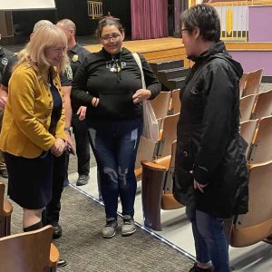 Malden Public Schools Supt. Dr. Ligia Noriega Murphy talks with some parents at the school safety presentation. (Advocate Photo)