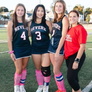 Revere field hockey captains, left to right, Ava Morris, Isabella Mendieta and Gemma Stamatopoulos and coach Victoria Correia.
