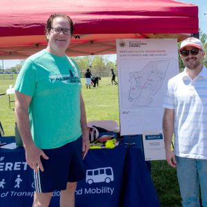 Special Assistant to the Mayor Chris Connolly and Transportation Planner Eric Molinari stood beside an interactive mapping activity during the City of Everett’s Transportation Fair at 7-Acre Park.