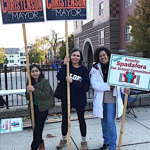 Ward 3 School Committee member Jennifer Spadafora (right) was a sign holder along with a pair of Mayor Christenson supporters outside the Beebe School on Election Day. (Advocate Photo)