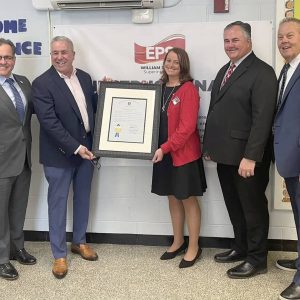 Pictured from left to right: Mayor Robert Van Campen, State Representative Joe McGonagle, Webster School Principal Devon Abruzzese, former Webster Principal/current Asst. Supt. Chris Barrett and Supt. of Schools William Hart. (Courtesy photo)